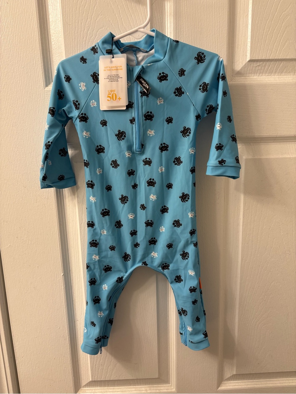 weVSwe Blue UPF 50+ Kids One-Piece Rashguard with Crab Print